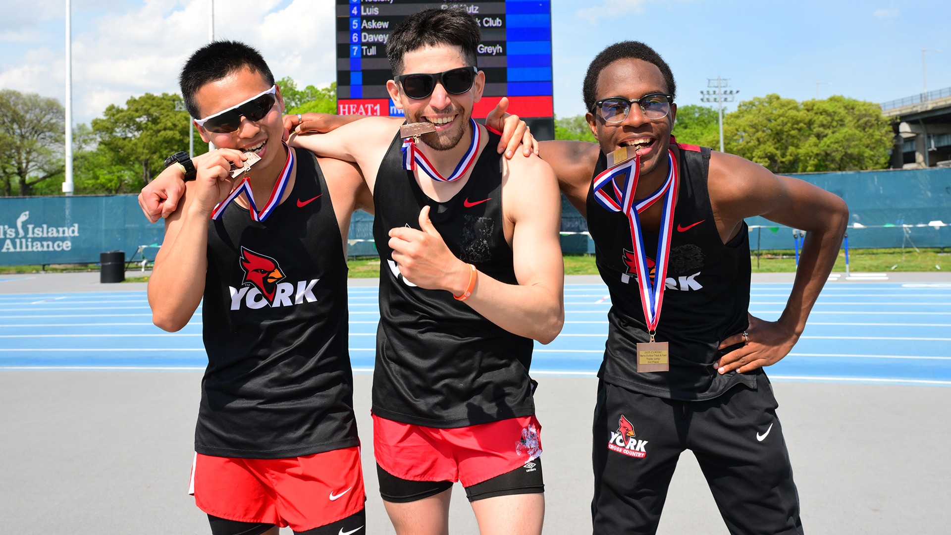(L-R) Michael Zhang, Richard Reyes and Chris Merilan medal at 2025 CUNYAC Outdoor Track & Field Championships