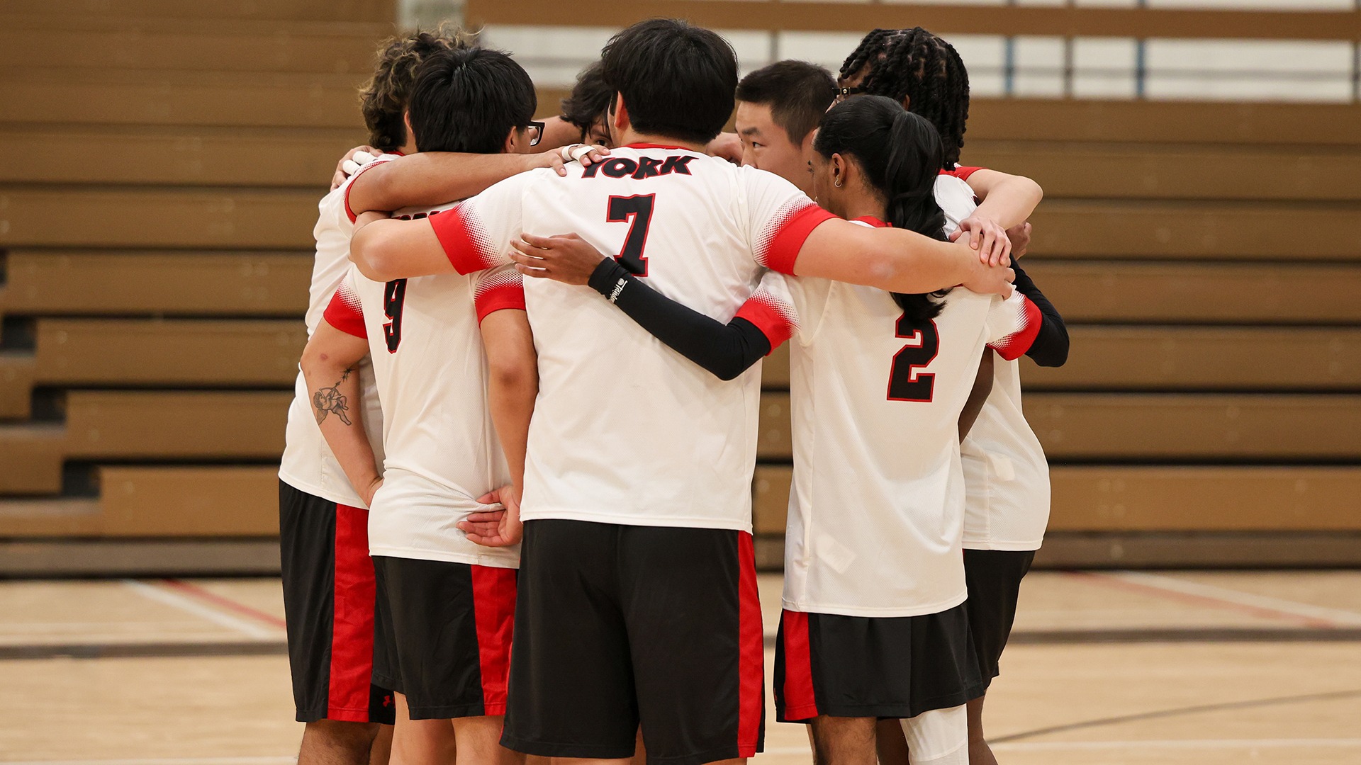 Men's Volleyball Team Huddle