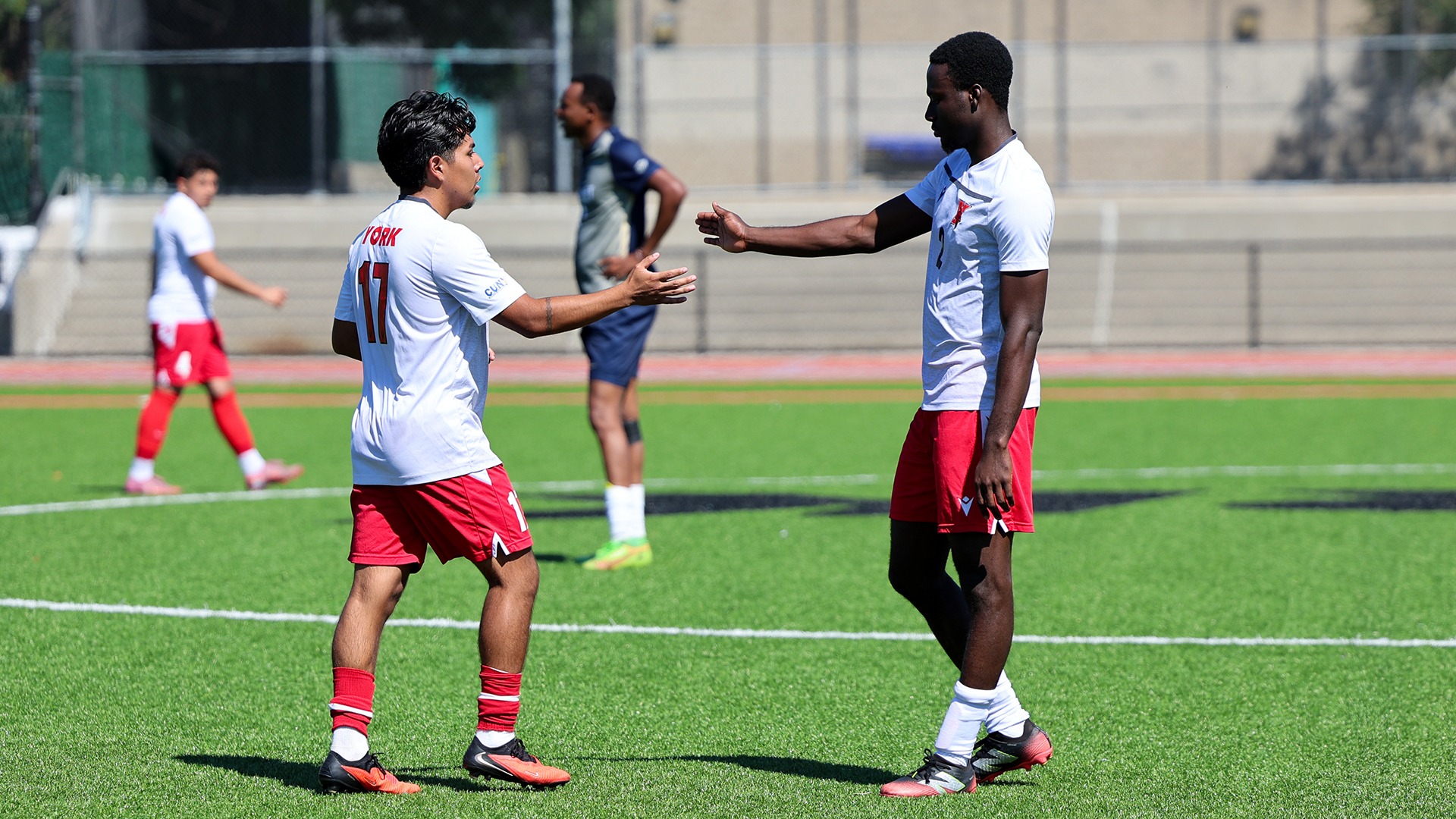 (L-R) Christopher Garcia celebrates with Derick Aboagye-Frimpong