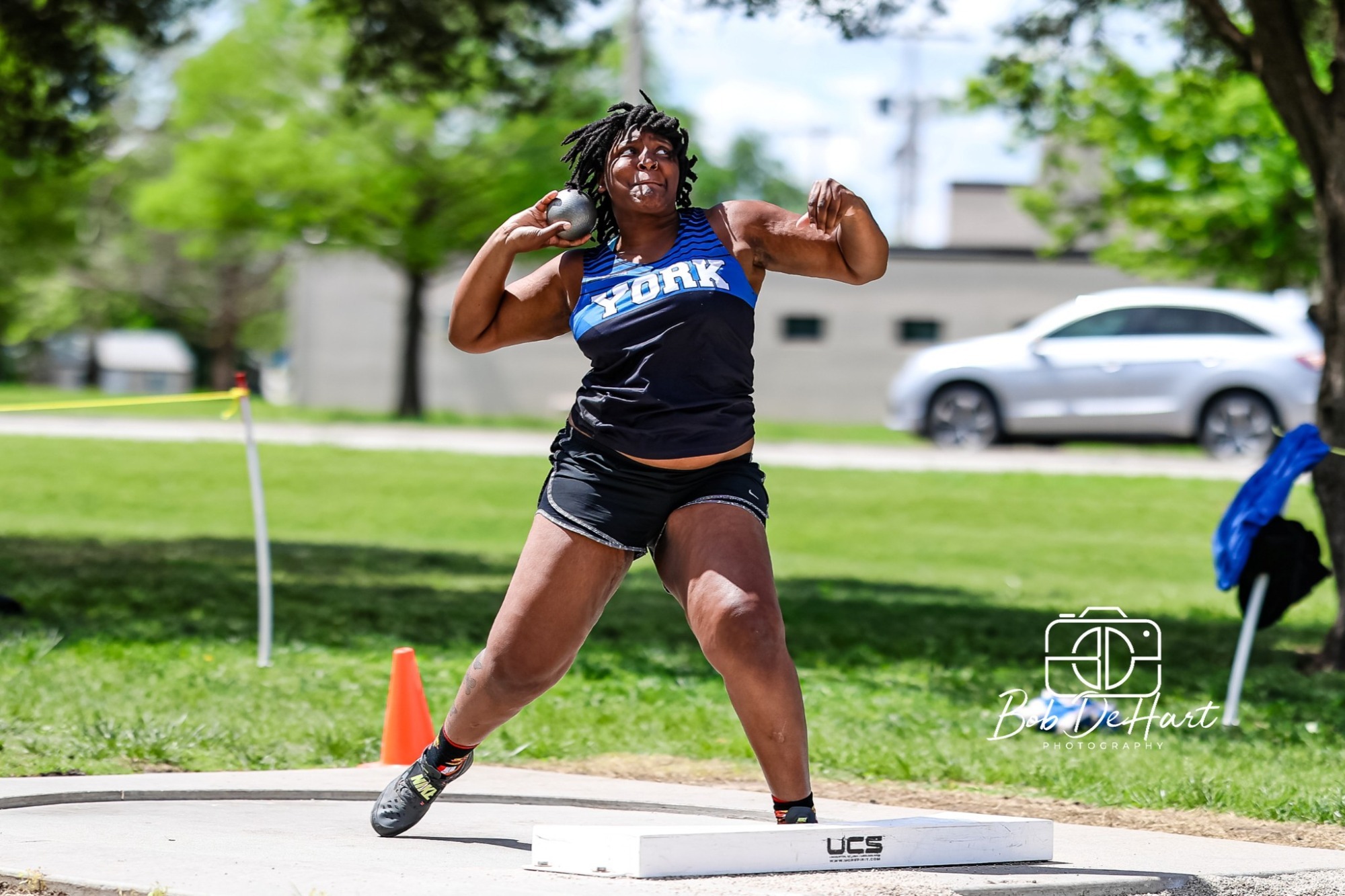 Jones throws the shot put at KCAC Championships