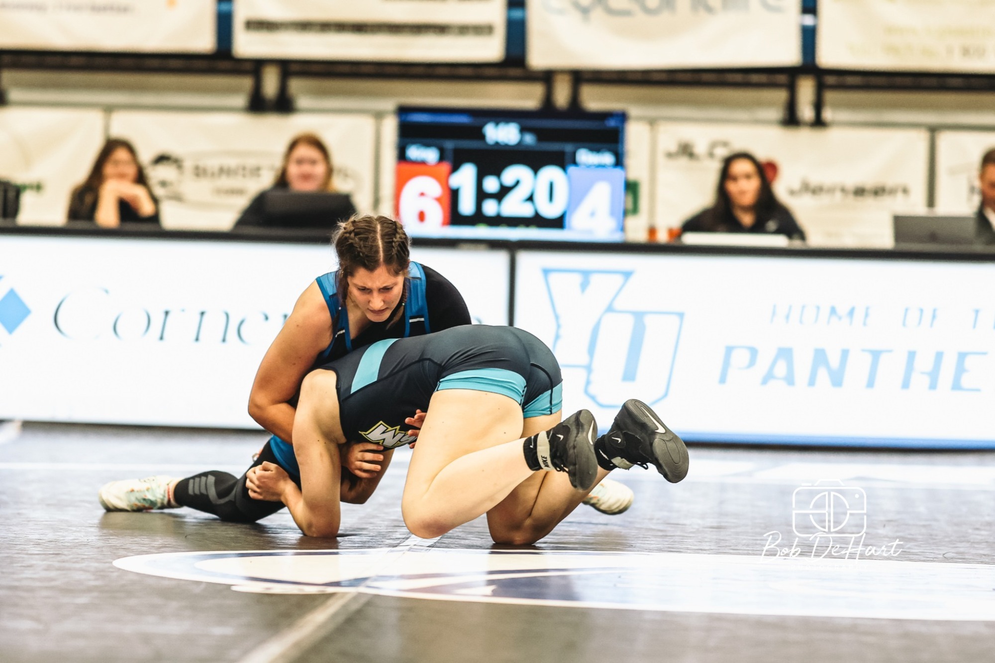 Maddie Davis wrestles against USM