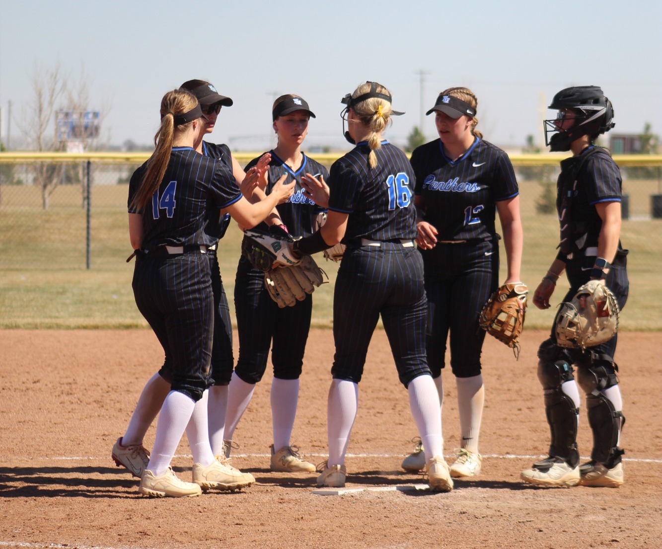 Huddle at pitcher circle