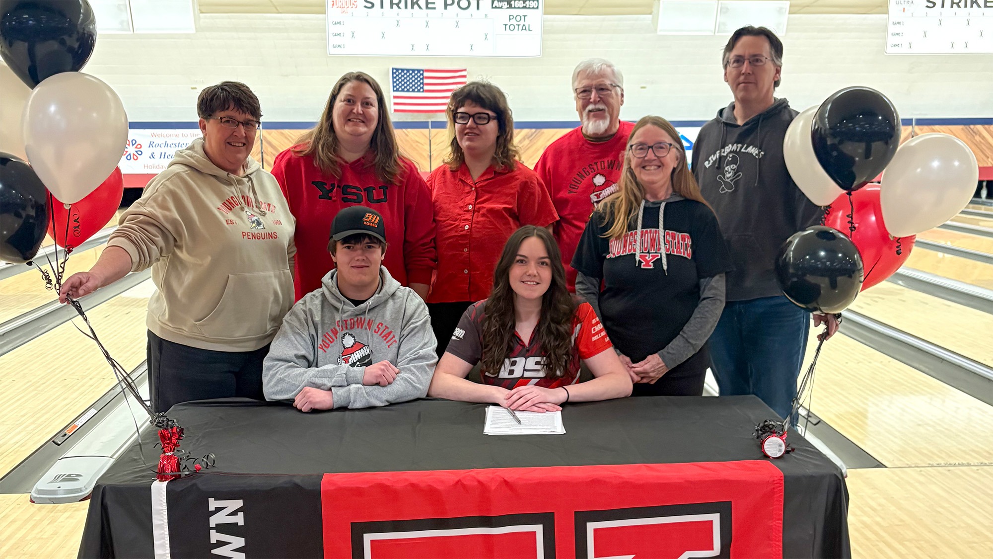 Taylor Lietha is surrounded by family and friends at her signing ceremony for the Youngstown State bowling program.