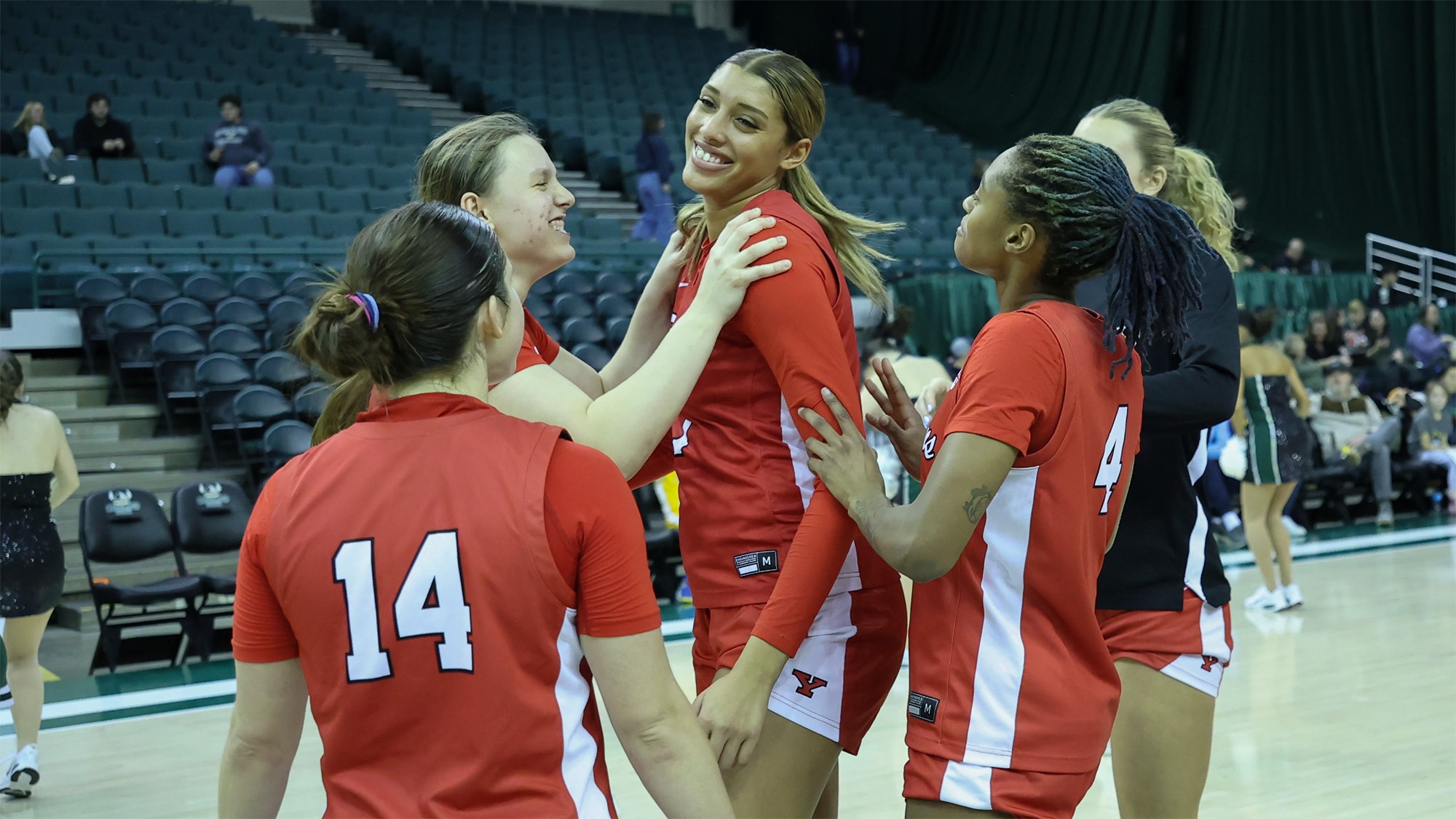 Paulina Hernandez celebrates on the floor after YSU's 70-63 win at Cleveland State