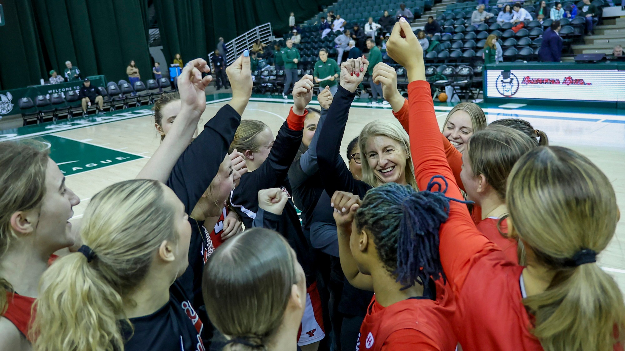 Youngstown State's women's basketball team huddles after its 70-63 victory at Cleveland State on Dec. 29, 2025.