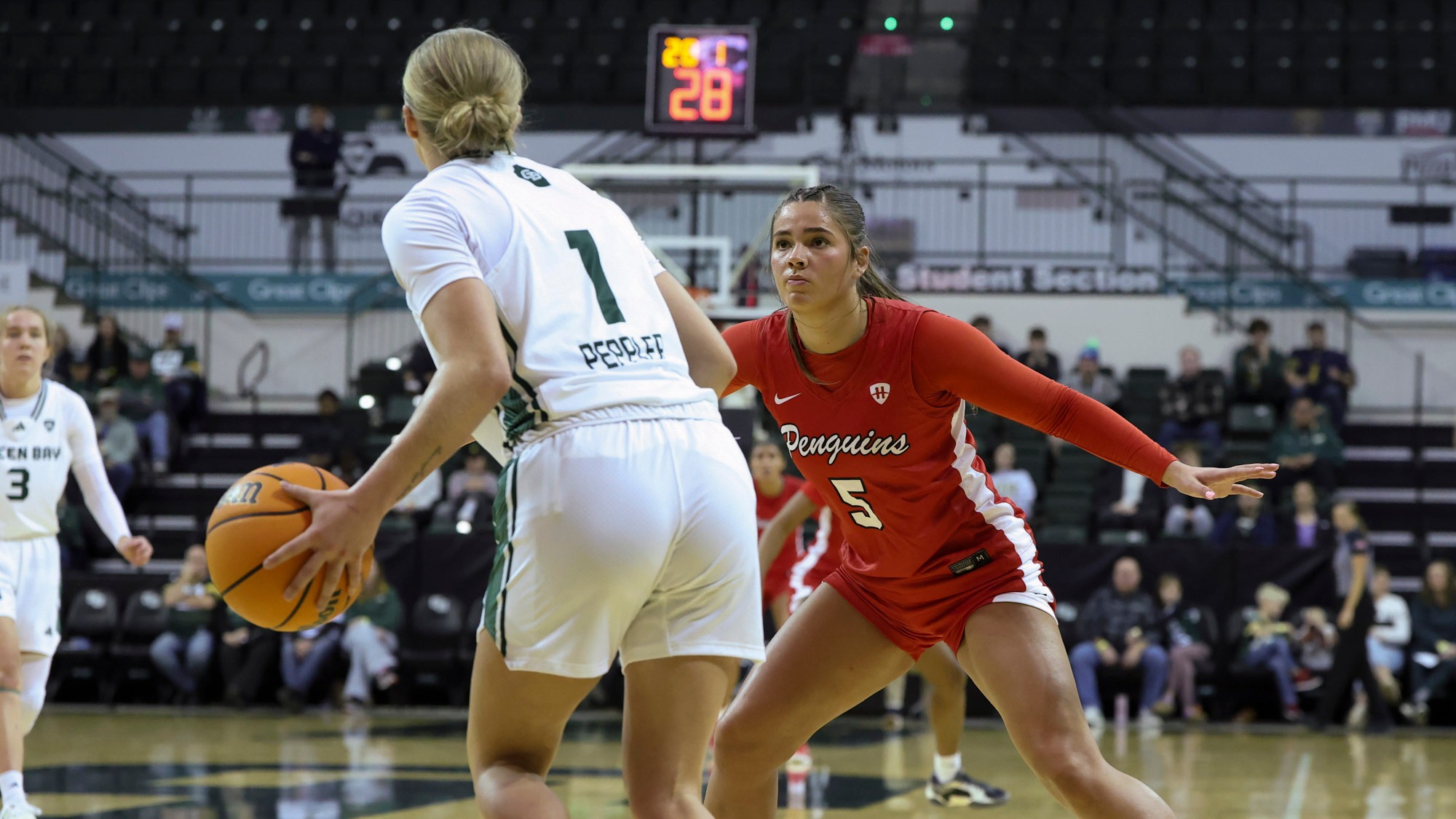 Hayden Barrier defends a Green Bay player in the Penguins' game at the Kress Center on Dec. 7, 2025. Photo by Chloe Whitlock