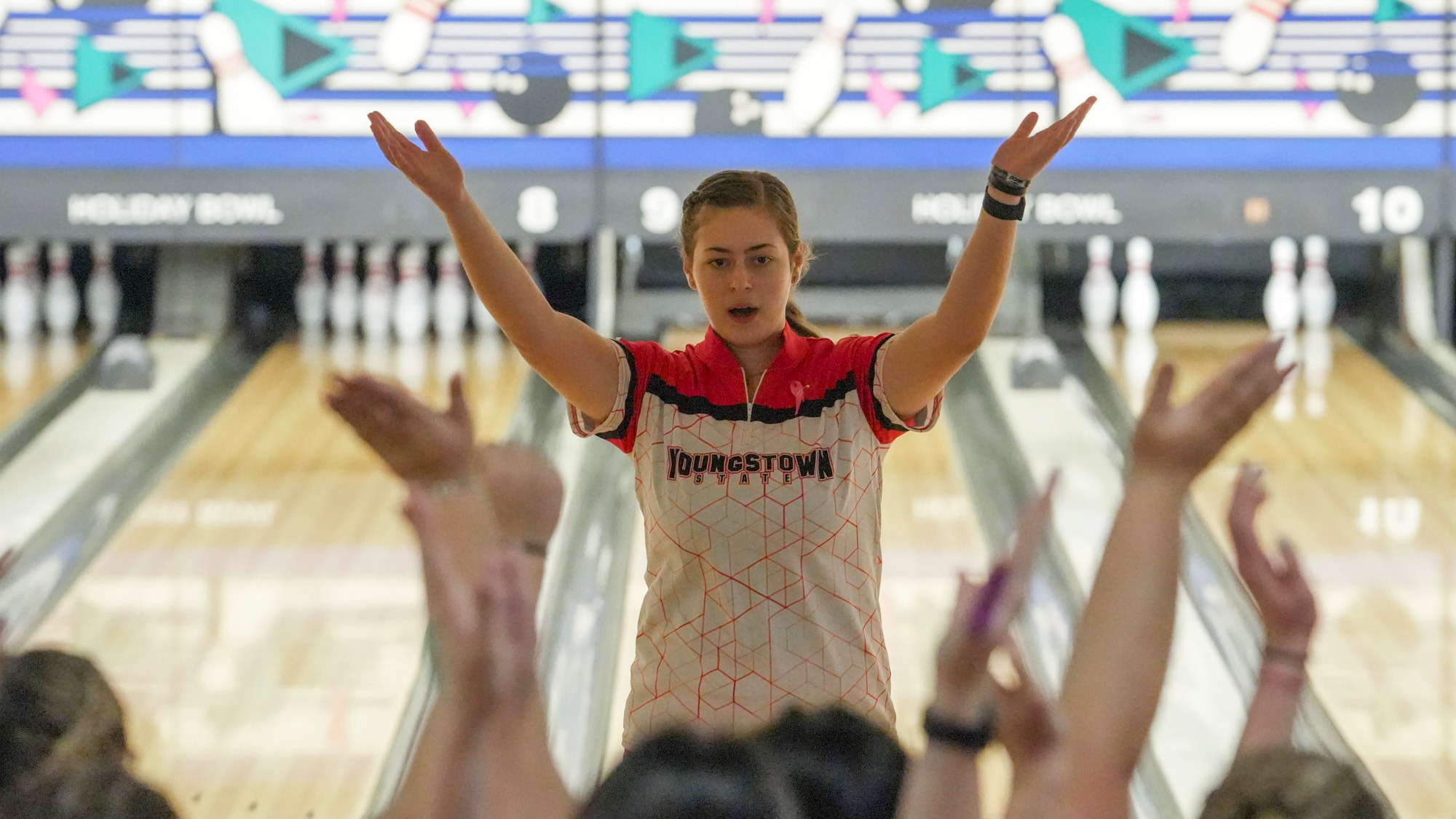 Gianna Varano celebrates a spare heading back to her Youngstown State bowling teammates at the 2026 Chelsea Gilliam Penguin Classic.