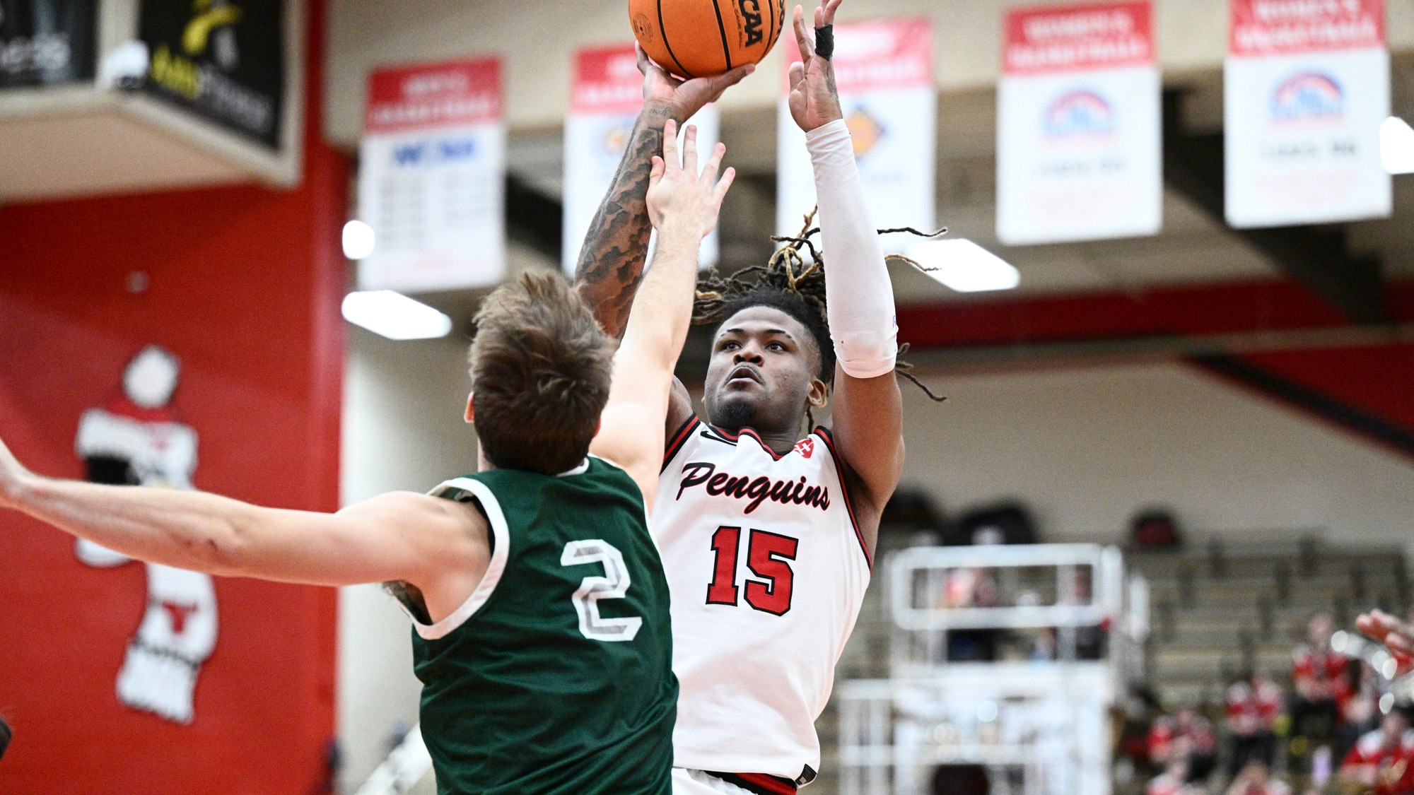 Cris Carroll shoots over a defender in Youngstown State's men's basketball game against Green Bay on Jan. 22, 2026.