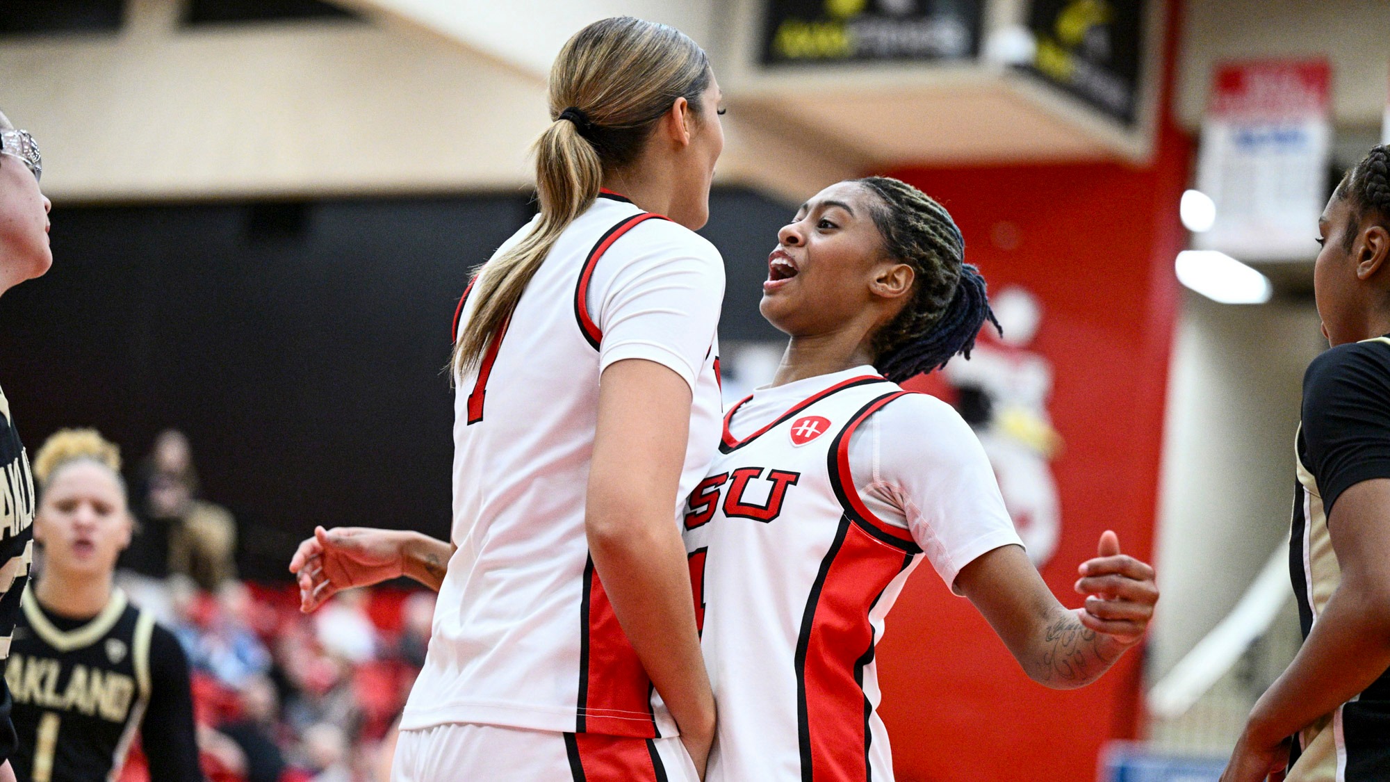 Erica King and Paulina Hernandez celebrate a basket in the Youngstown State women's basketball game vs. Oakland on Jan. 5, 2026. Photo by Robert Hayes.