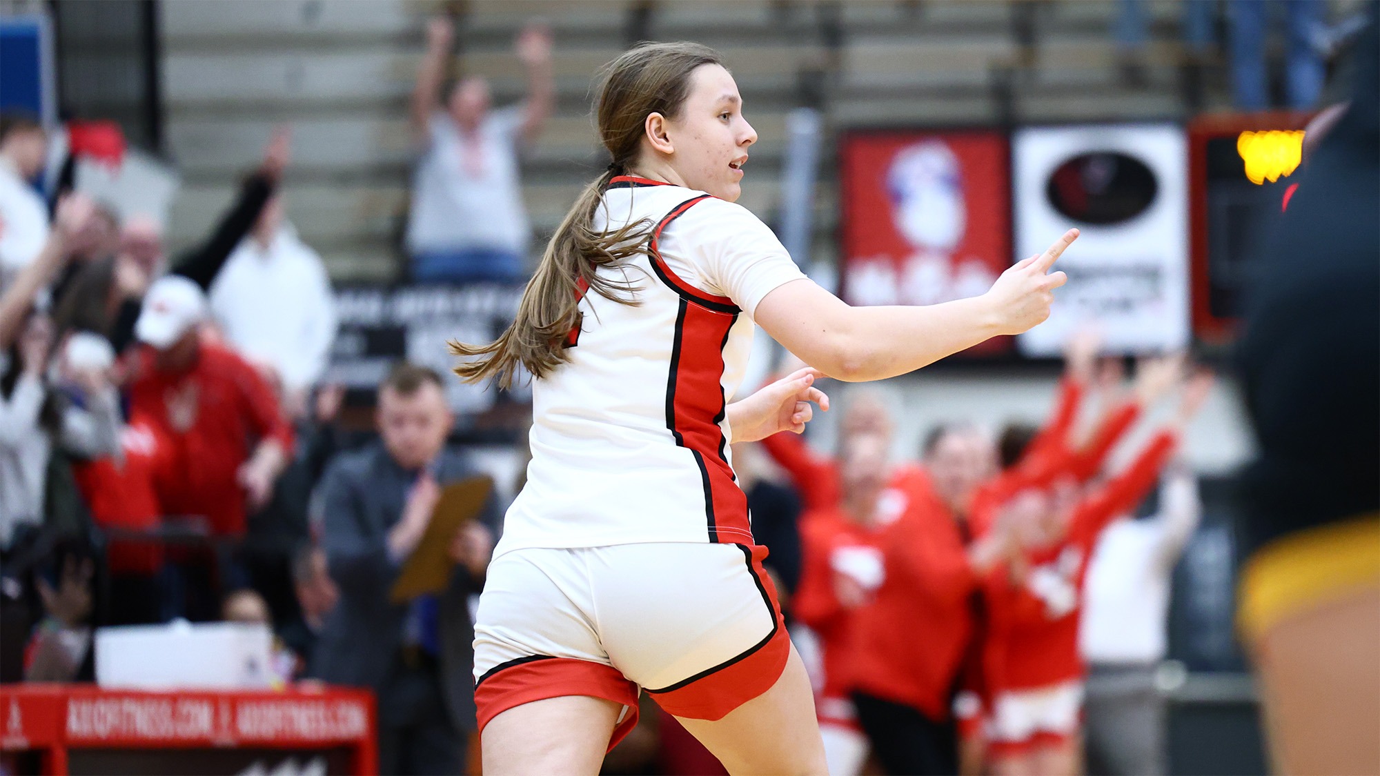 Danielle Cameron points toward a teammate after making a 3-pointer.