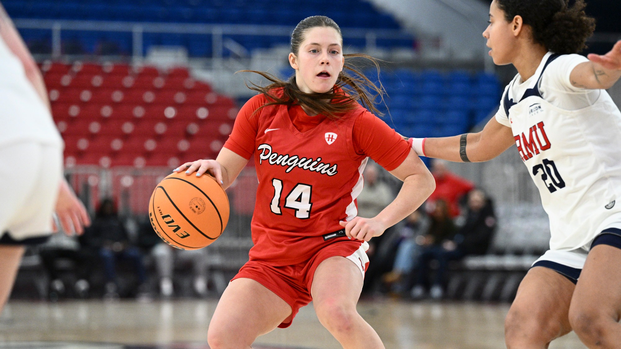 Casey Santoro dribbles against a Robert Morris defender on Jan. 21, 2026. Photo by Robert Hayes