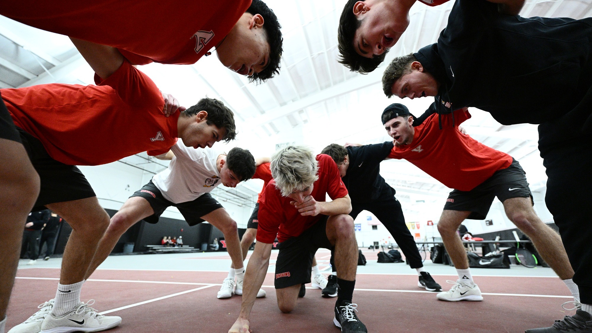 Men's Tennis huddle