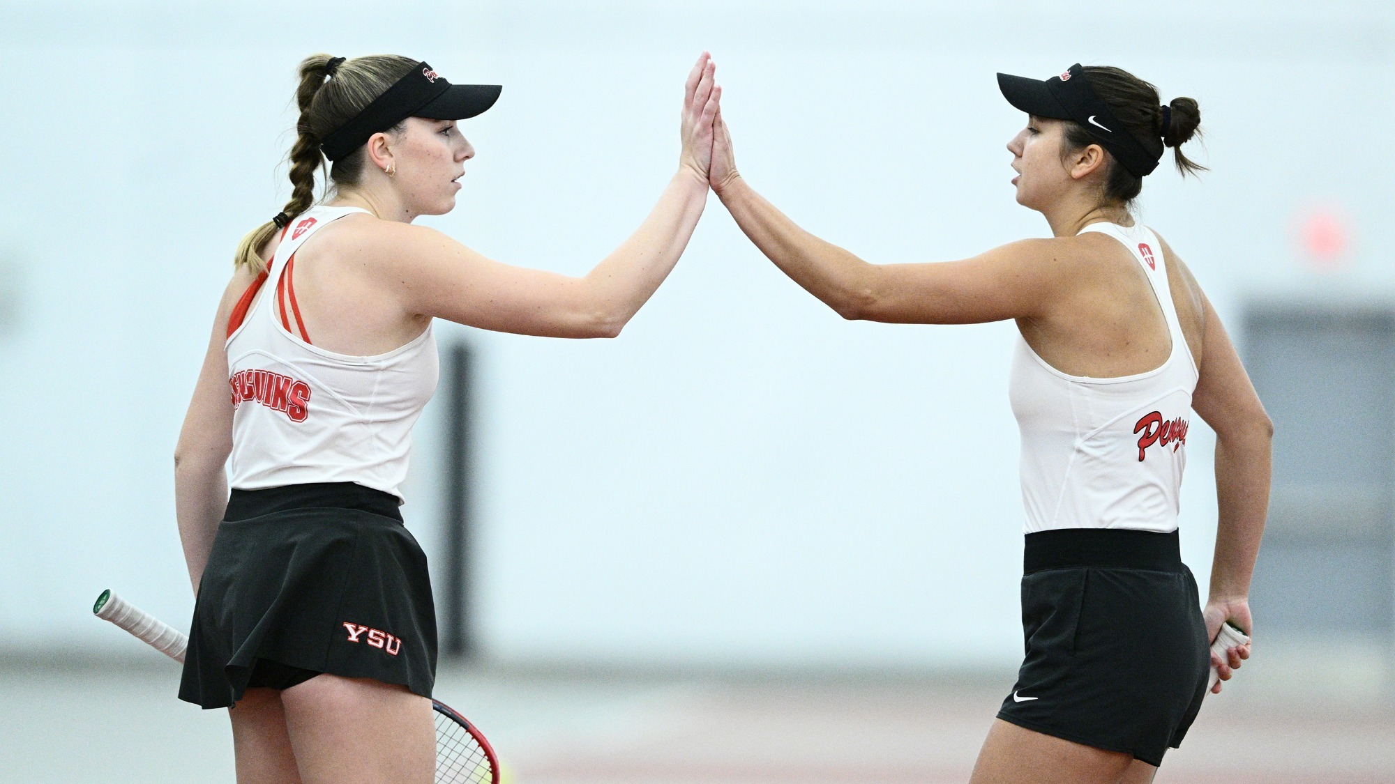 Lydia Foster and Yeseniia Ovcharova high five