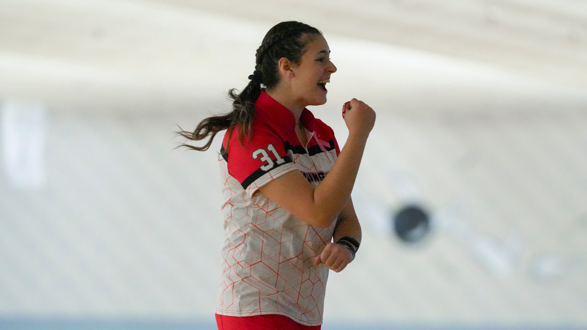 Gianna Varano pumps her fist after a strike
