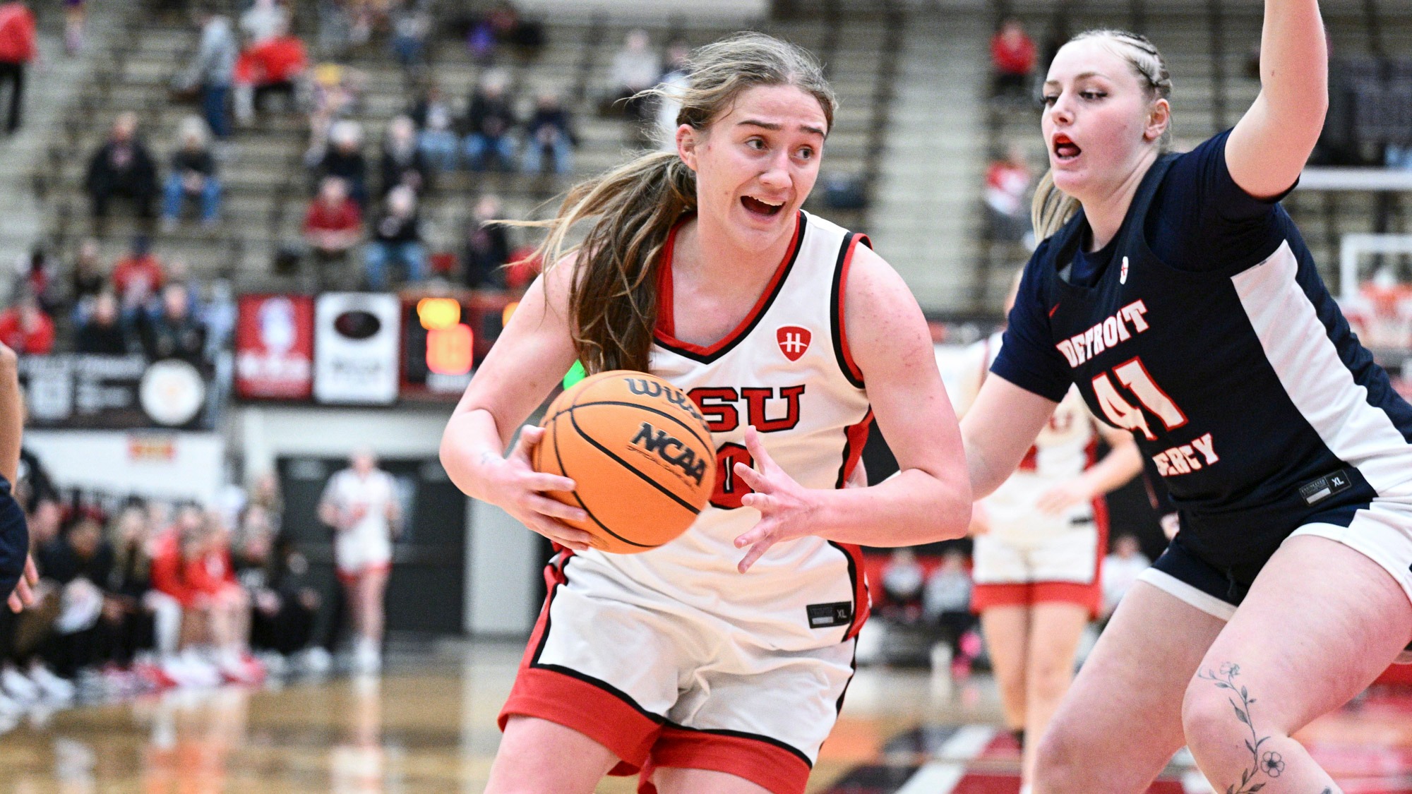 Sarah Baker drives against a Detroit Mercy defender for Youngstown State on Feb. 25, 2026.