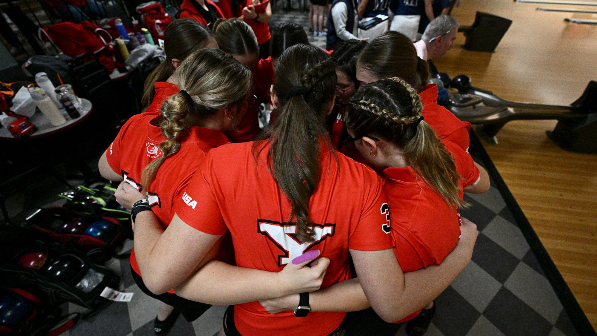 Youngstown State's bowling team huddles before the 2025 Chelsea Gilliam Penguin Classic on Oct. 19, 2025. Photo by Robert Hayes.