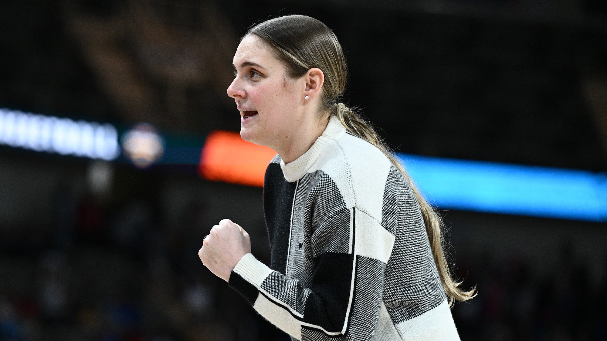 Coach Shayna Gore pumps her fist during Youngstown State's women's basketball game against Green Bay in the Horizon League Championship.