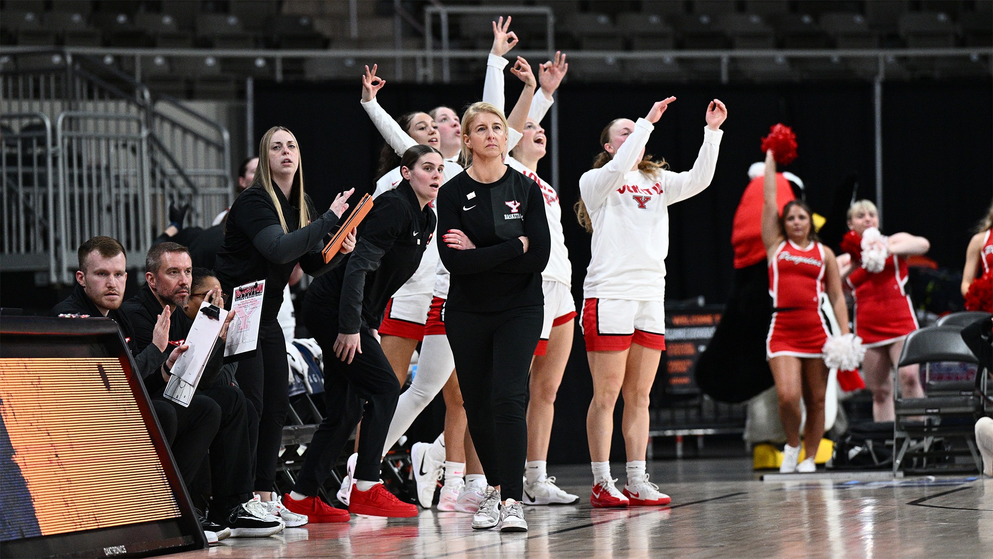 Head Coach Melissa Jackson walks on the sideline as YSU's bench celebrates a 3-pointer in the semifinals of the 2026 Horizon League Women's Basketball Championship.