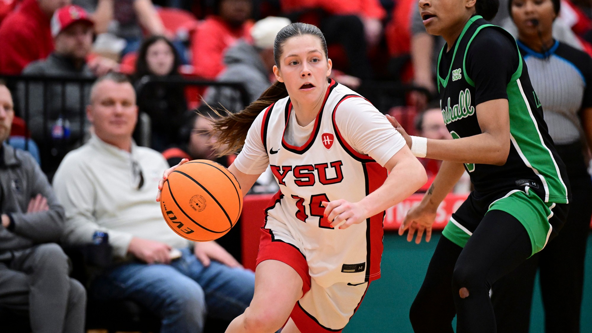 Casey Santoro drives against a Marshall defender on March 27, 2026.