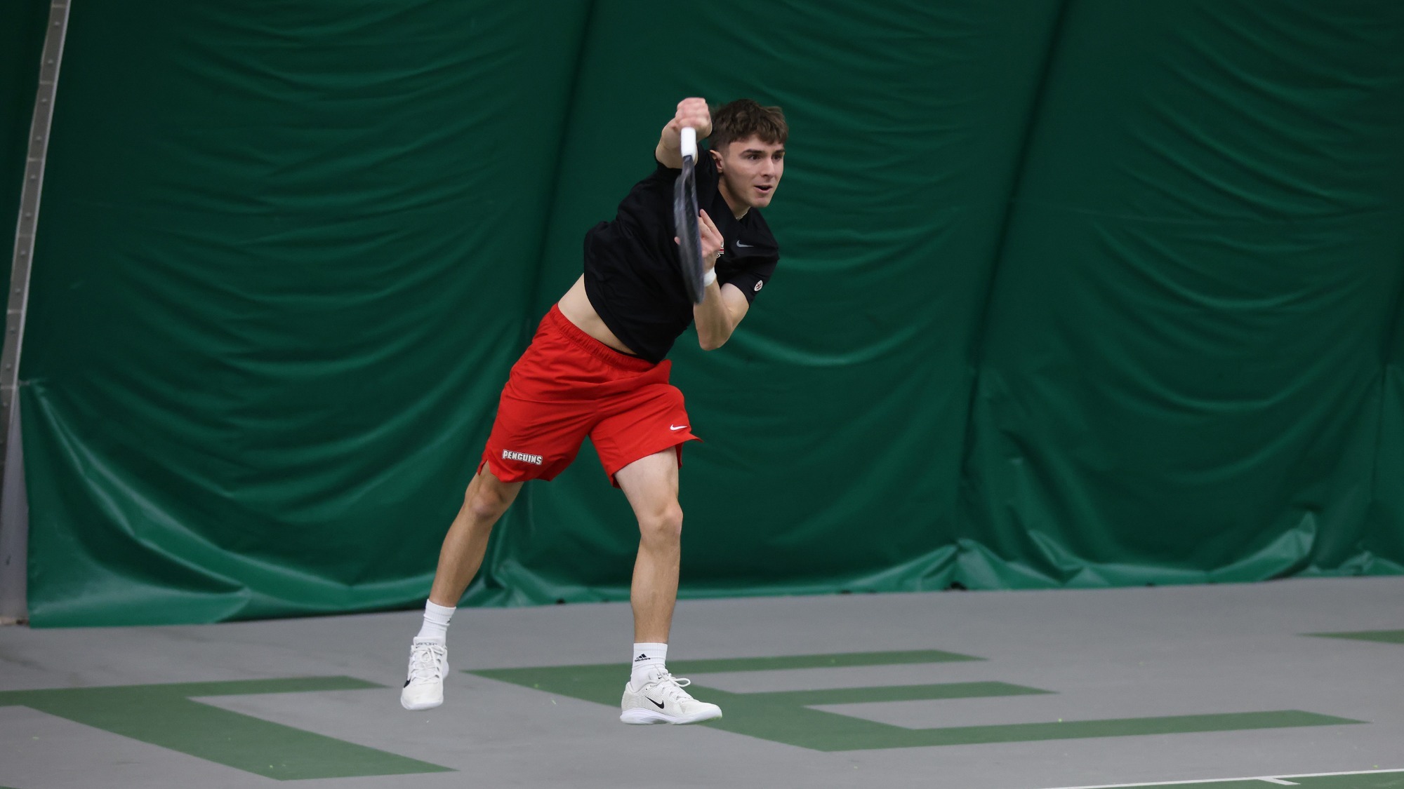 Dominik Vonbank serves against Cleveland State