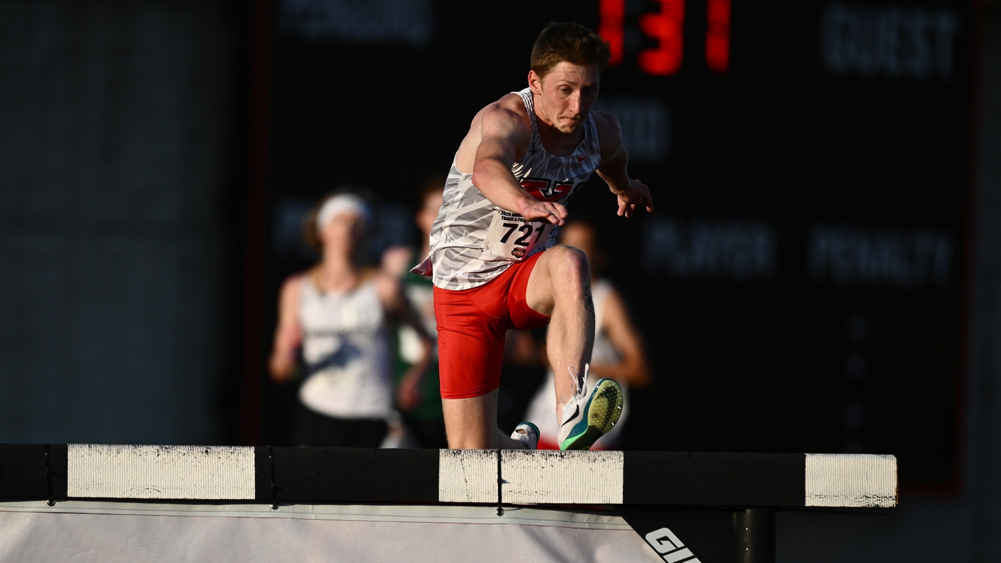 Sage Vavro jumps a barrier during the steeplechase