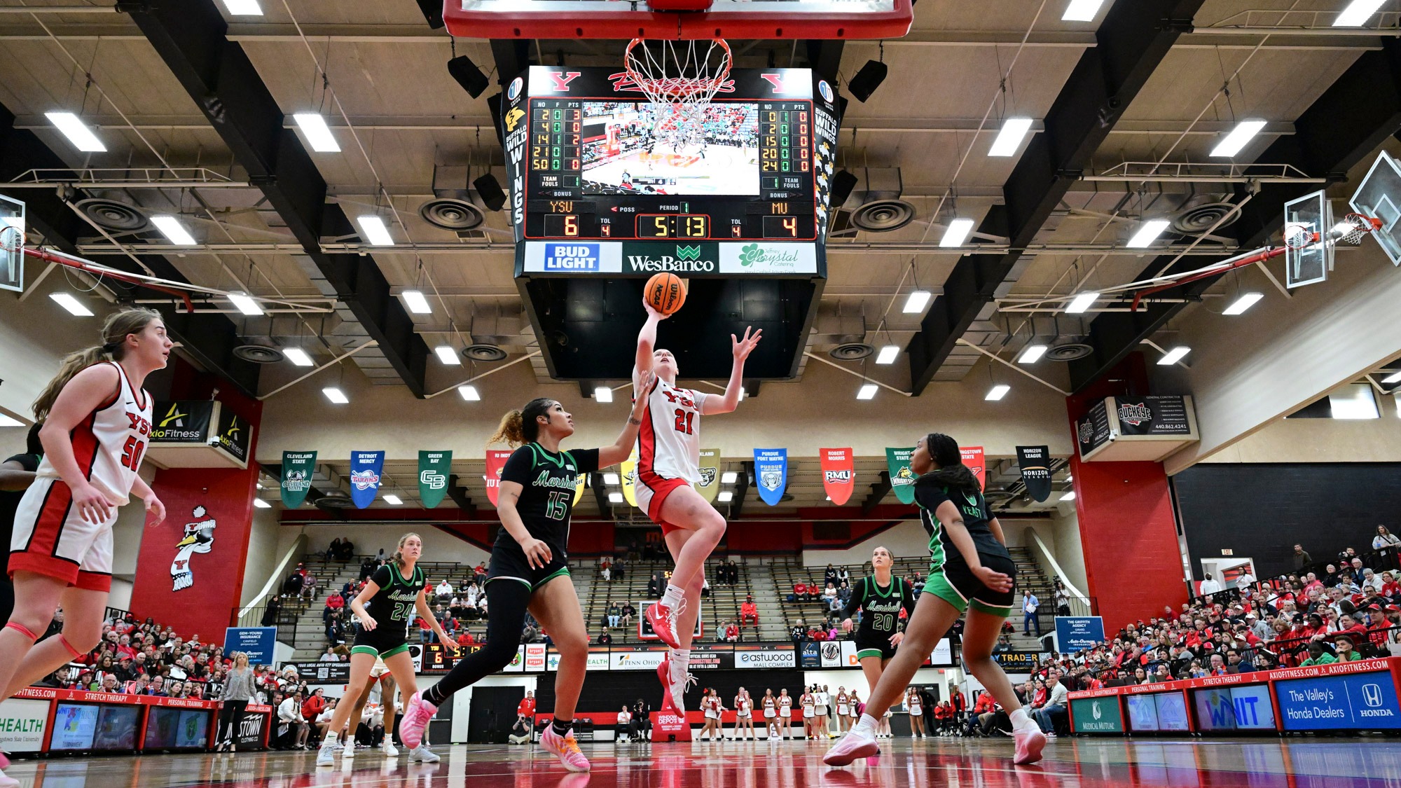 Upward angle of Sophia Gregory attempting a layup for YSU against Marshall on March, 27, 2026. Photo by David Dermer.
