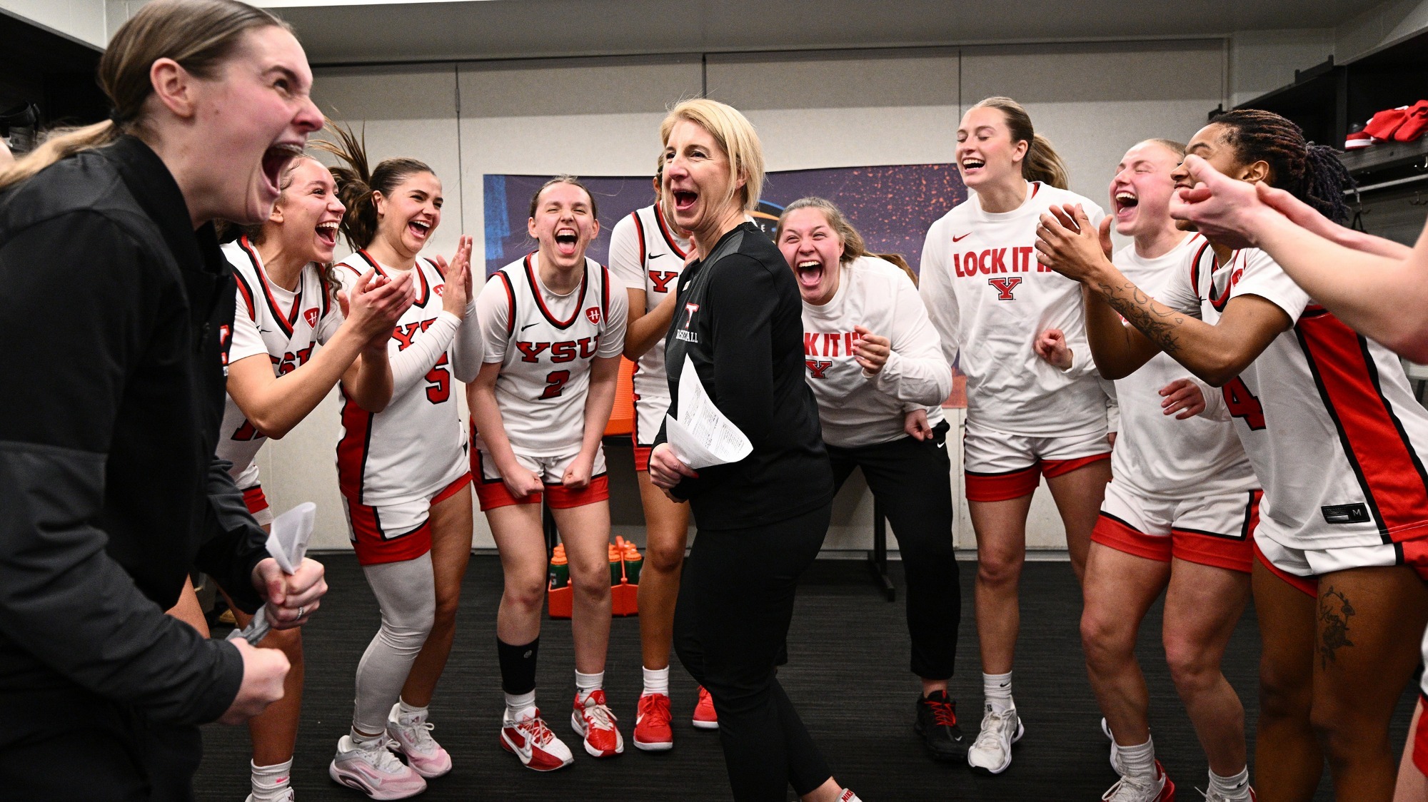 The YSU Women's Basketball team celebrates an HL semifinal win over Cleveland State