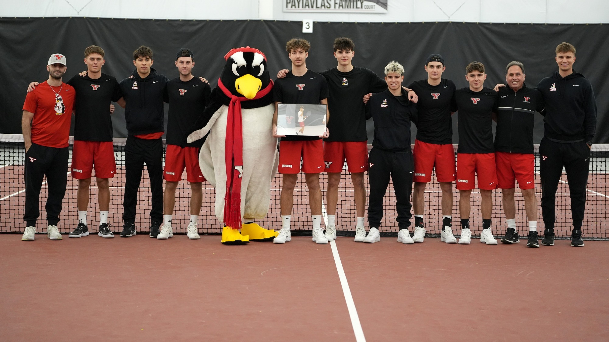 Men's Tennis team poses for a photo after the team's senior day.