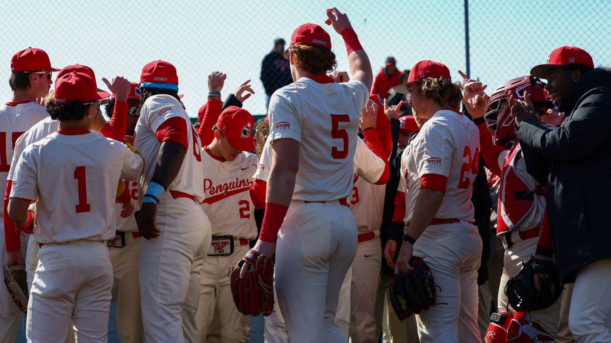 YSU baseball players huddle before taking the field for a game vs. Oakland at Pullman Park on March 14, 2026 (Photo by Bryson Chavez)