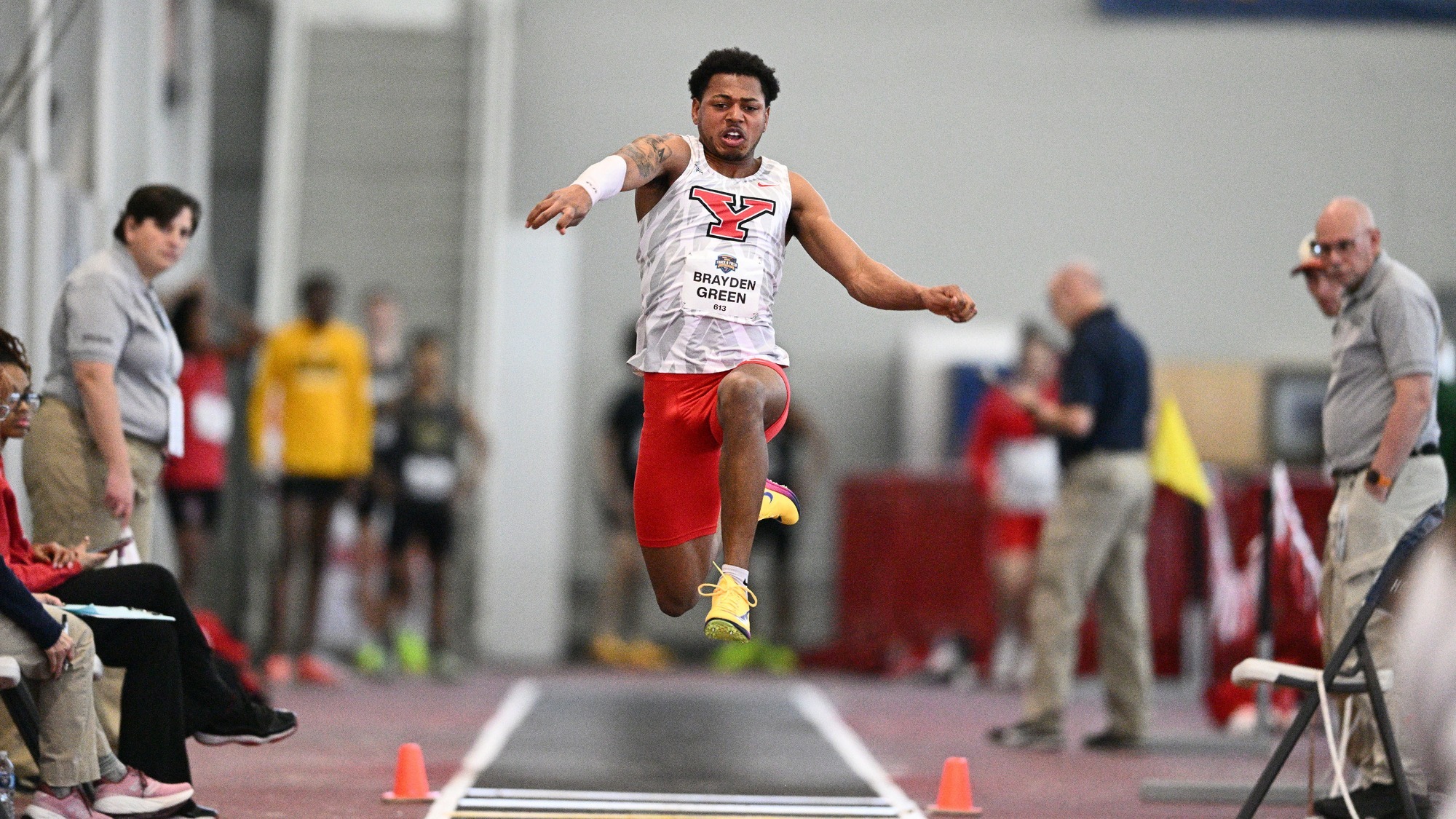 Brayden Green competes in the triple jump