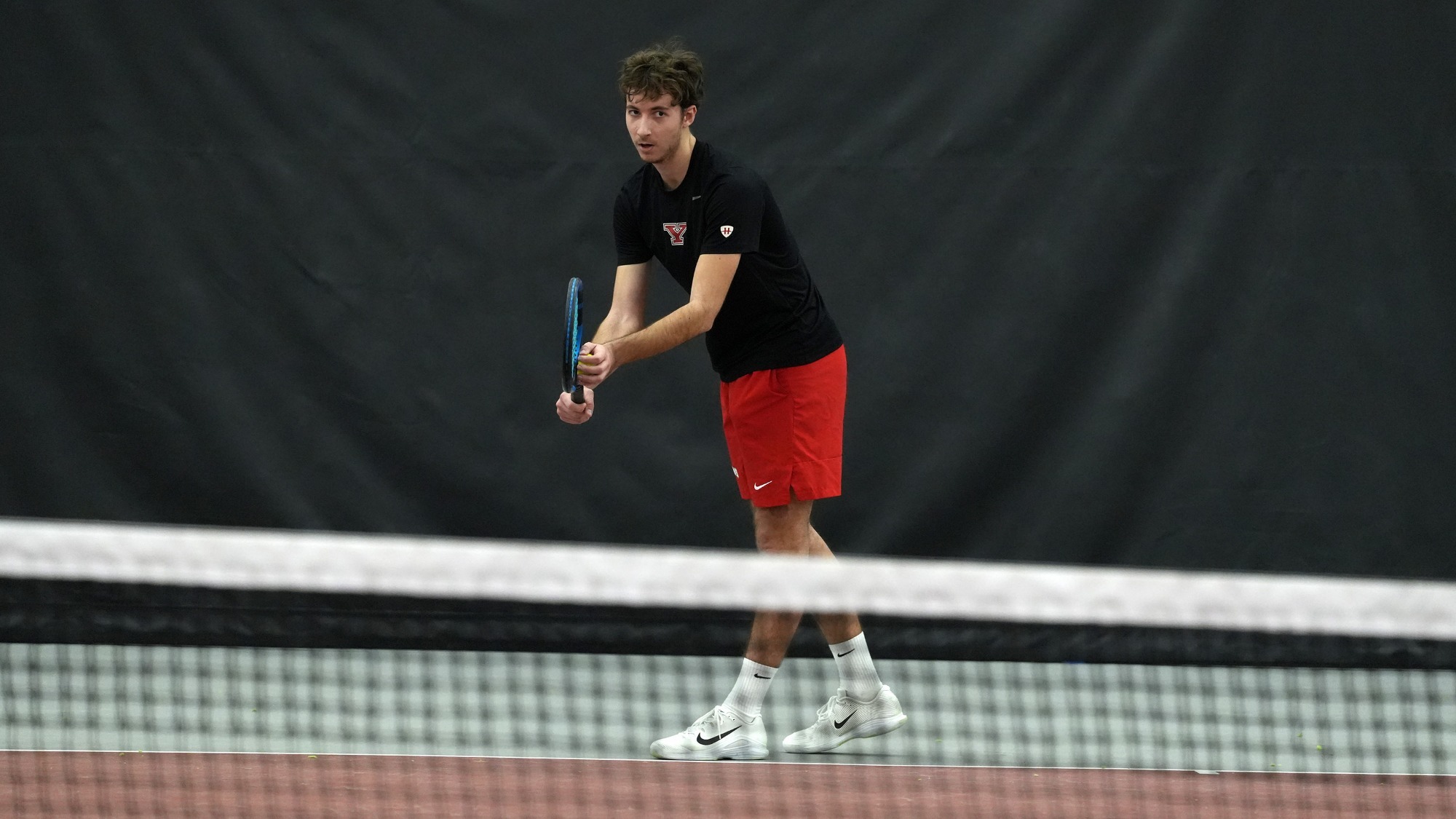 Alexis Maulouet prepares to serve vs. NKU