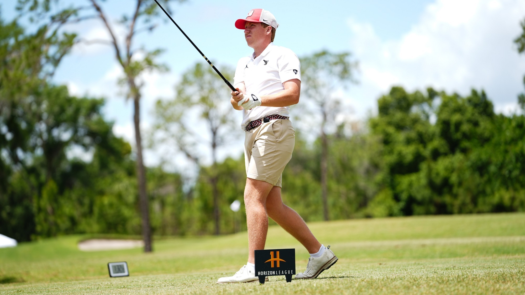 Ryan Sam watches a tee shot for YSU during the 2026 Horizon League Men's Golf Championship on April 26, 2026 (Photo by Drae Smith)