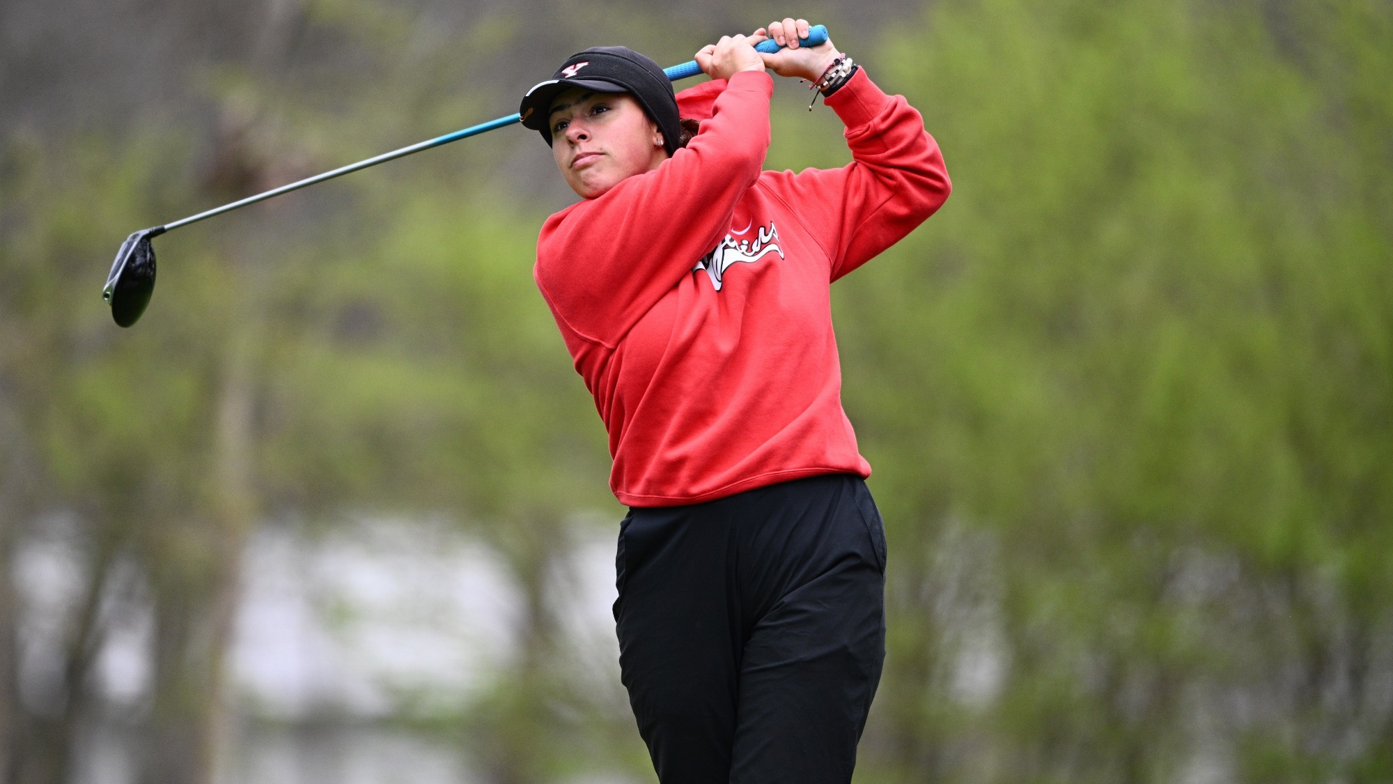 Valentina Peña Anaya watches her tee shot at the YSU Spring Invitational at Trumbull Country Club on April 5, 2026 (Photo by Robert Hayes)