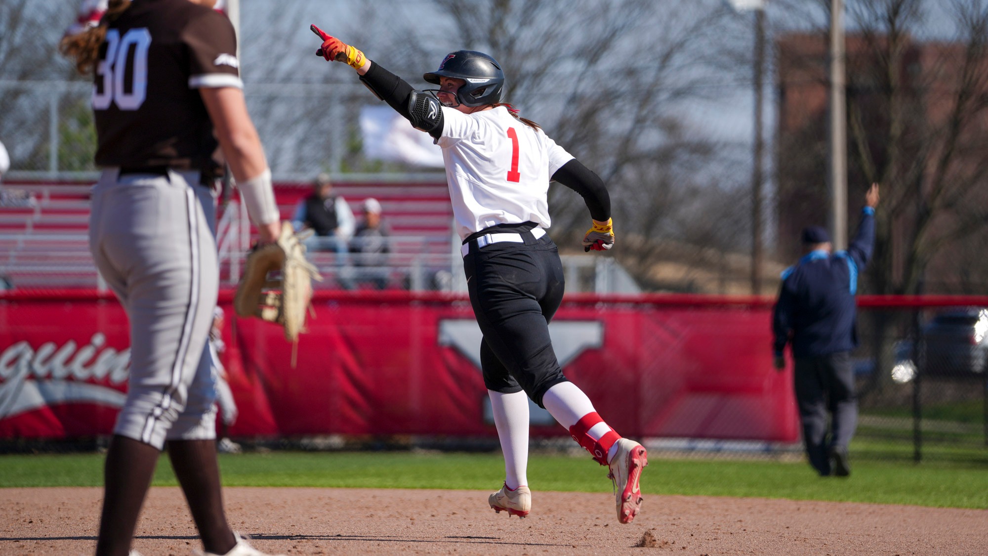 YSU's Kennedy Dean points to the dugout while running the bases on a home run trot against St. Bonaventure on April 8, 2026, at the YSU Softball Complex.