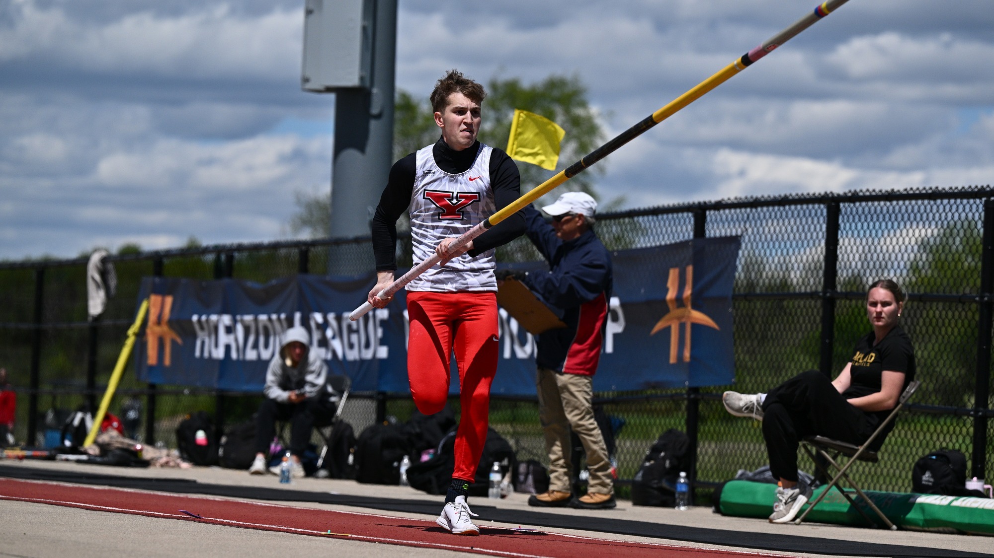 Lukas Lang runs down the pole vault runway at the Horizon League Championships