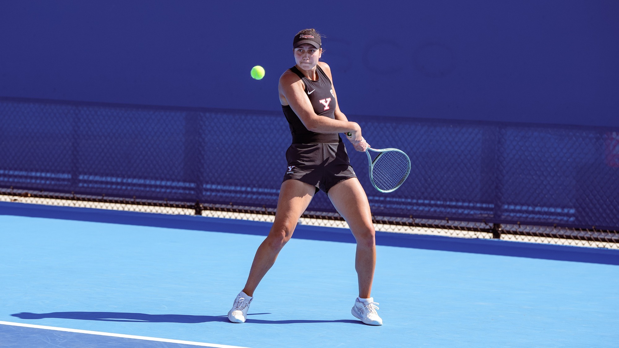Yeseniia Ovcharova returns a backhand shot