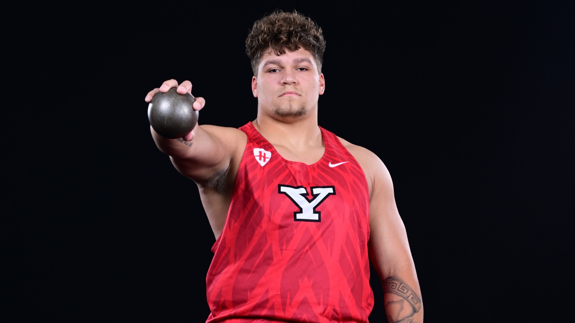 Jaden Kirkwood holds a shot put at 2026 Track and Field Media Day
