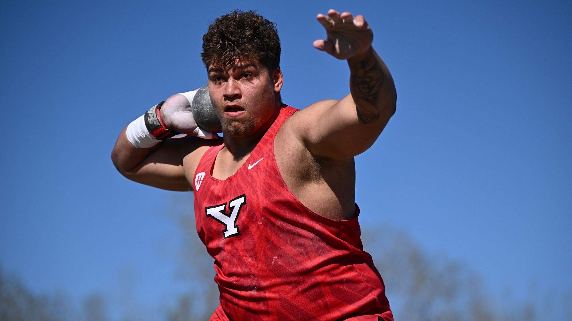 Jaden Kirkwood throws the shot put at the Horizon League Championships
