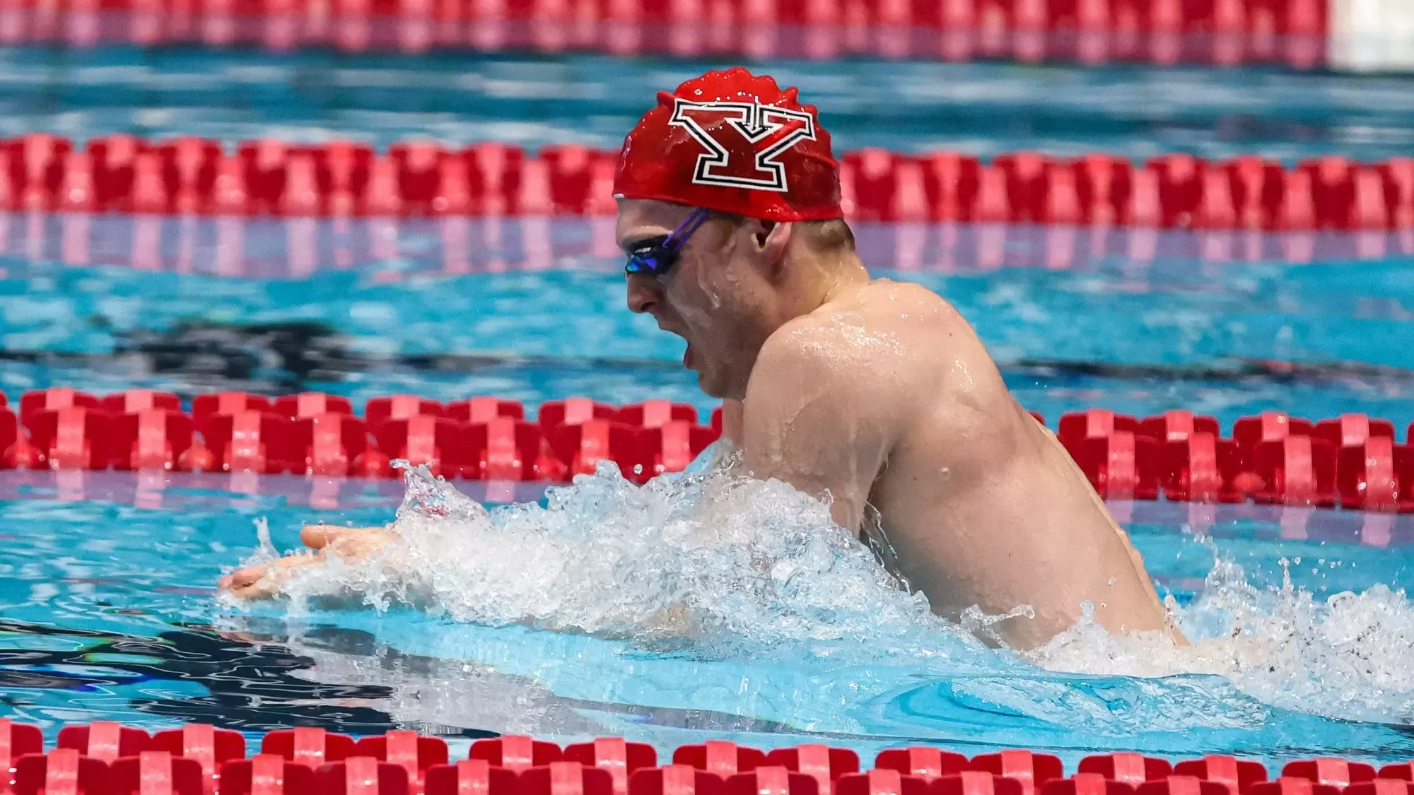 James Slessor does the breaststroke at the 2026 Horizon League Championships