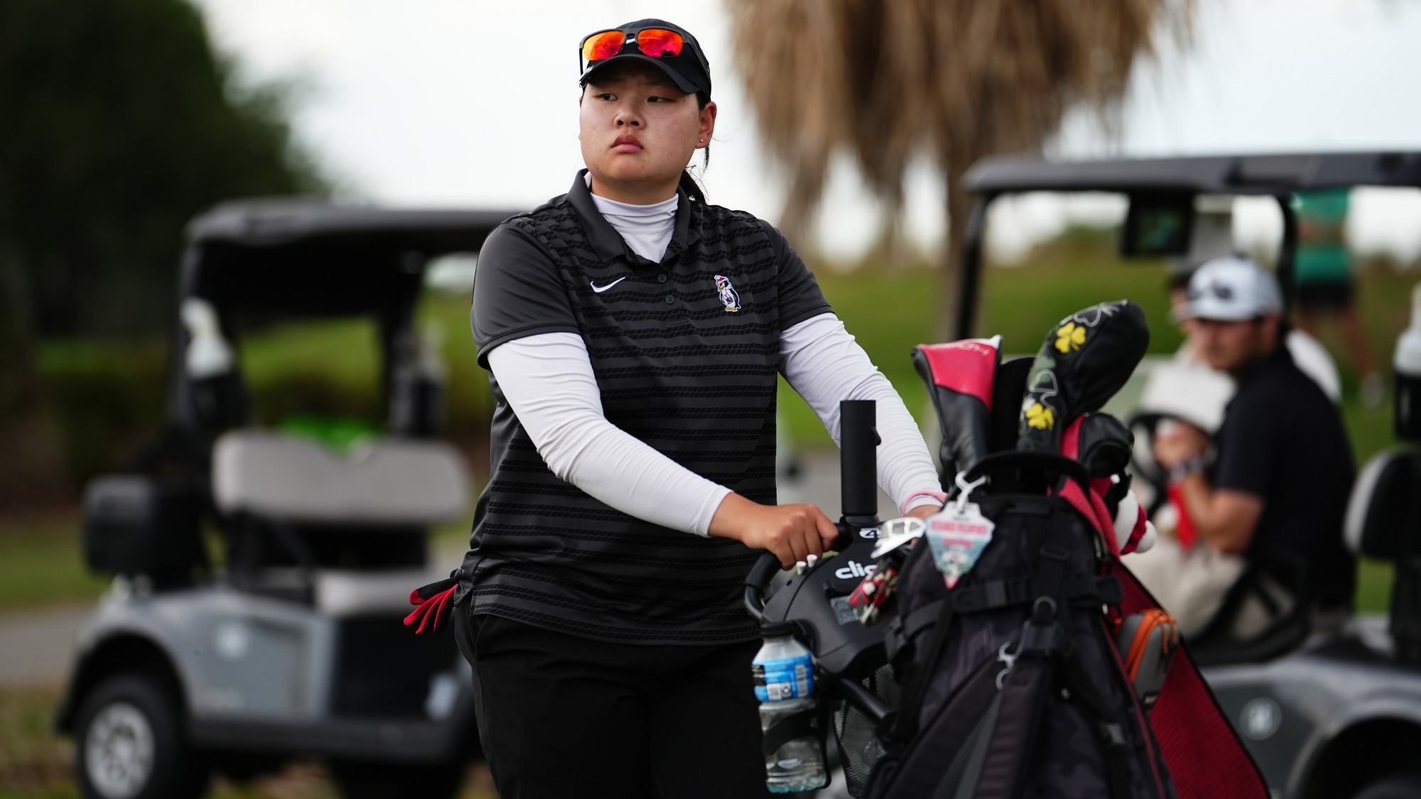 Neeranuch Prajunpanich walks to a tee box for YSU during the 2026 Horizon League Women's Golf Championship (Photo by Drae Smith)