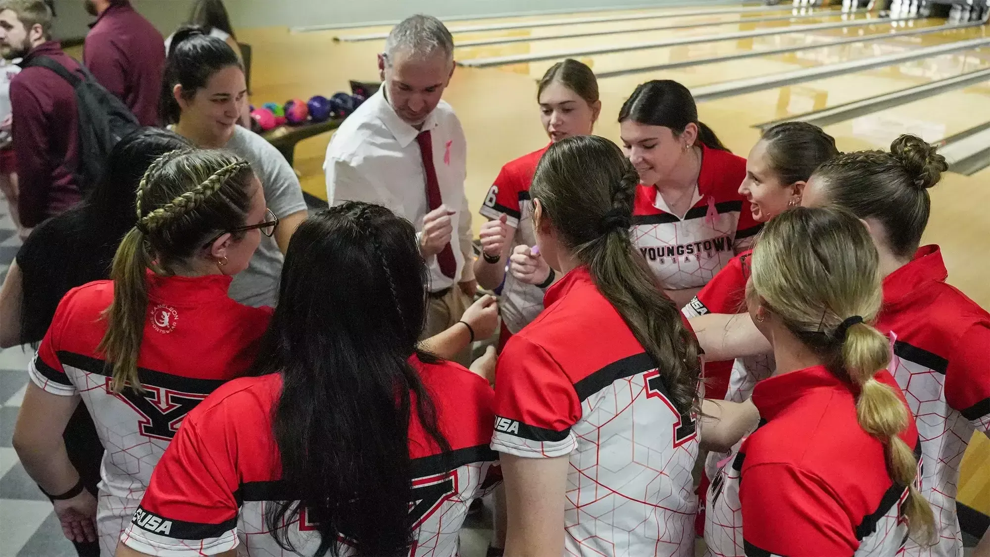 YSU's bowling team huddles before day two of the 2025 Chelsea Gilliam Penguin Classic