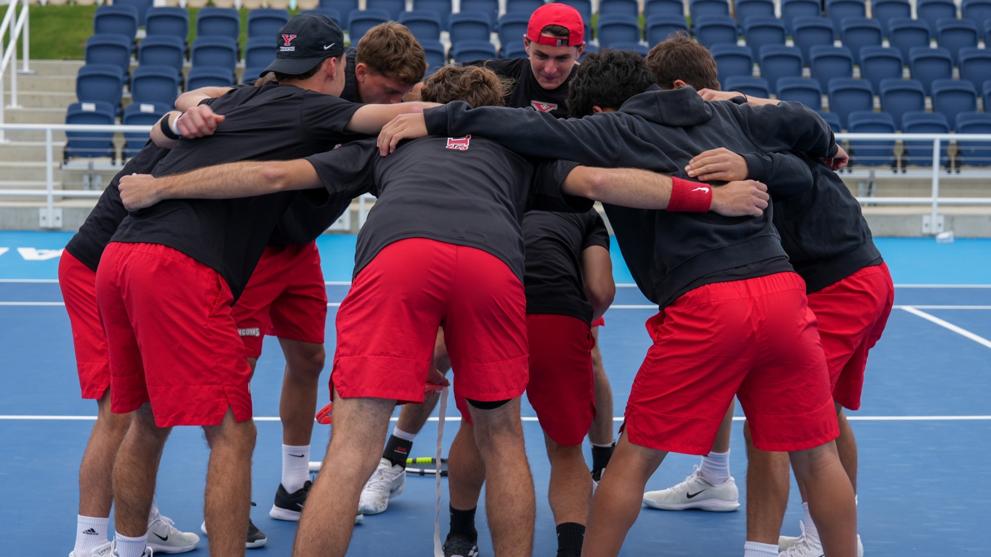 YSU Men's Tennis huddles prior to the Horizon League Championships