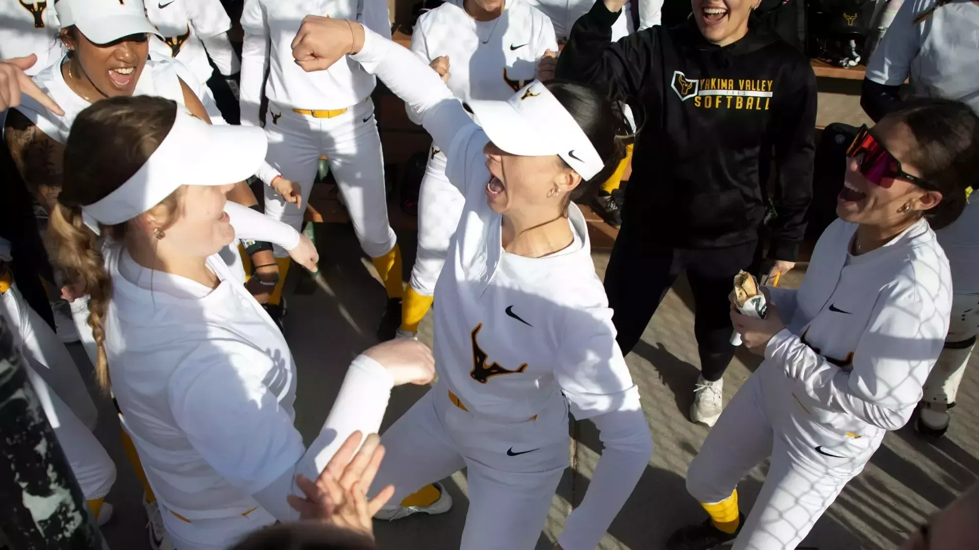 Tylie Cossitt dances with teammate