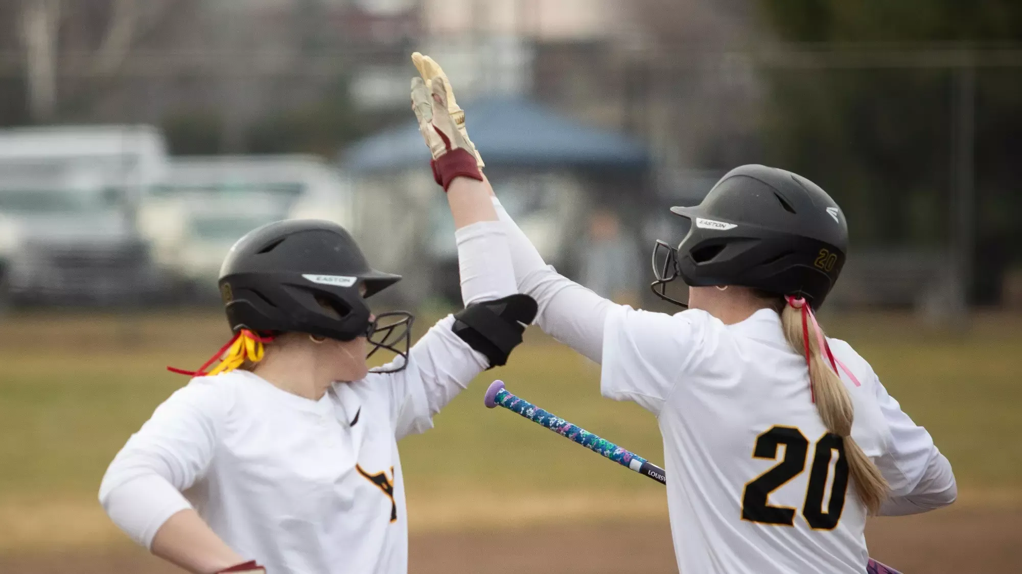 Riley Eckhardt celebrates with teammates